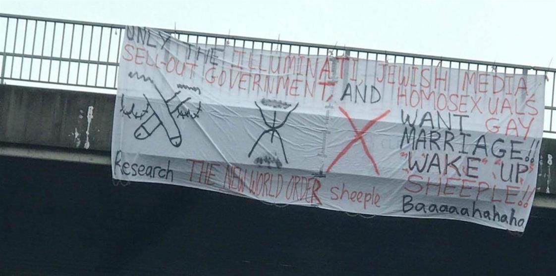 Explicit anti–marriage equality banner unfurled over Brisbane highway