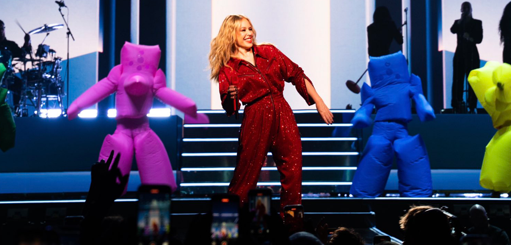 Straight Kylie Minogue Fan Roasted For Telling Kylie Her Concert Was ‘Too Woke & Gay’