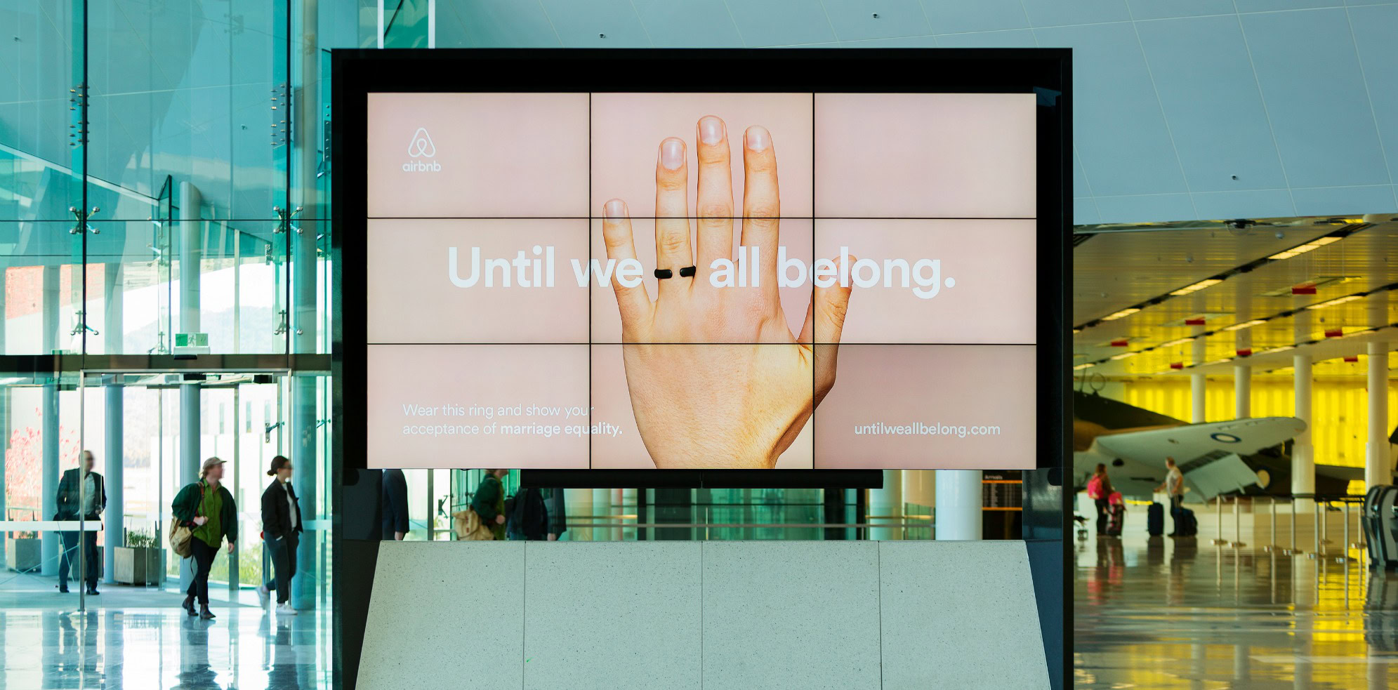 Politicians greeted by marriage equality billboards at Canberra airport